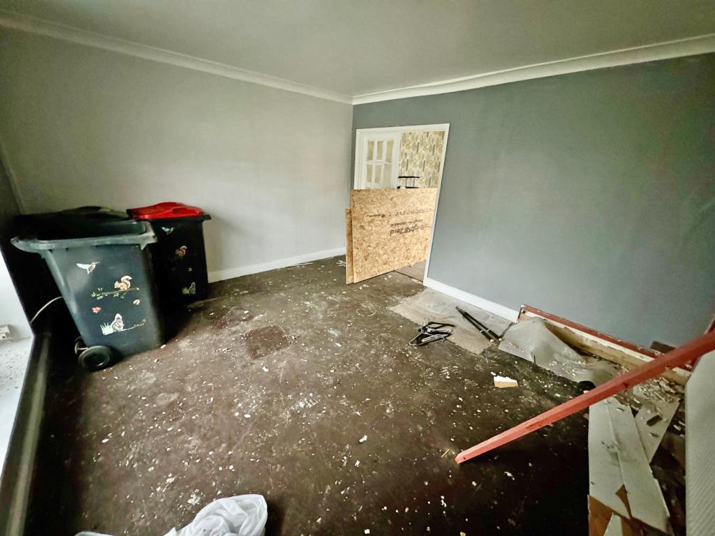 Lot: 12 - THREE-BEDROOM HOUSE FOR IMPROVEMENT AND REPAIR - Living room